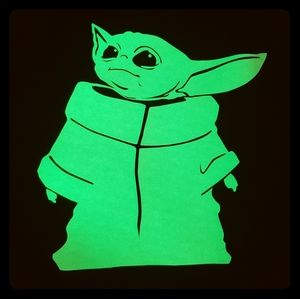 The child (baby Yoda) t-shirts